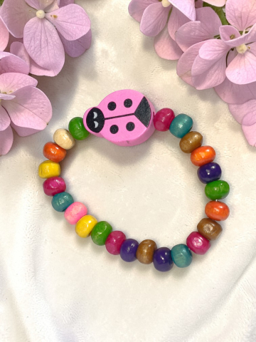 BRĂȚĂRI VELVETKIDS - Brățară  Copii Reglabilă Din Lemn cu Buburuză Roz Handmade „Buburuza cu Noroc"