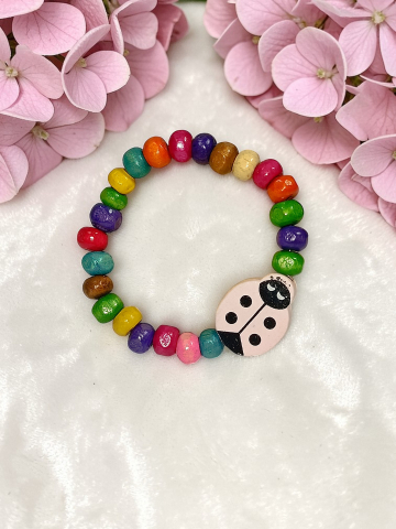 BRĂȚĂRI VELVETKIDS - Brățară Copii Reglabilă Din Lemn cu Buburuză Roz Handmade „Zâmbet de Gâză"