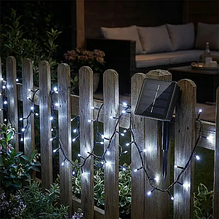 Iluminat - Instalație LED Solară pentru Exterior: 12 m, 100 LED Alb Rece, 8 Moduri de Iluminare și Panou Solar Inclus – Economie de Energie și Atmosferă Magică