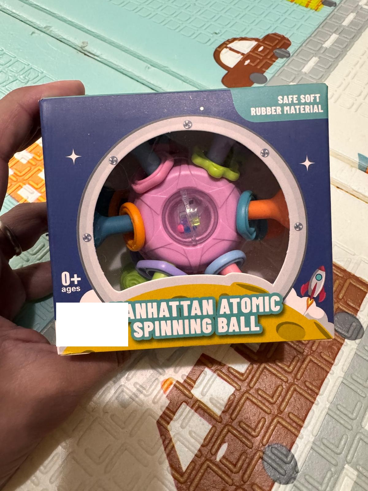 Jucarie senzoriala bebelusi mingiuta zornaitoare Atomic Ball colorata